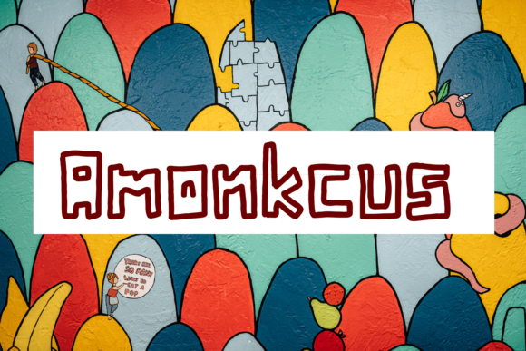 Amonkcus: A Quirky Outlined Display Font for Campaign Design